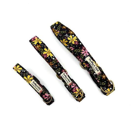 Floral-patterned dog collar and leash set on a white background
