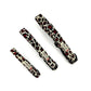 Three leopard print collars with red accents on a white background