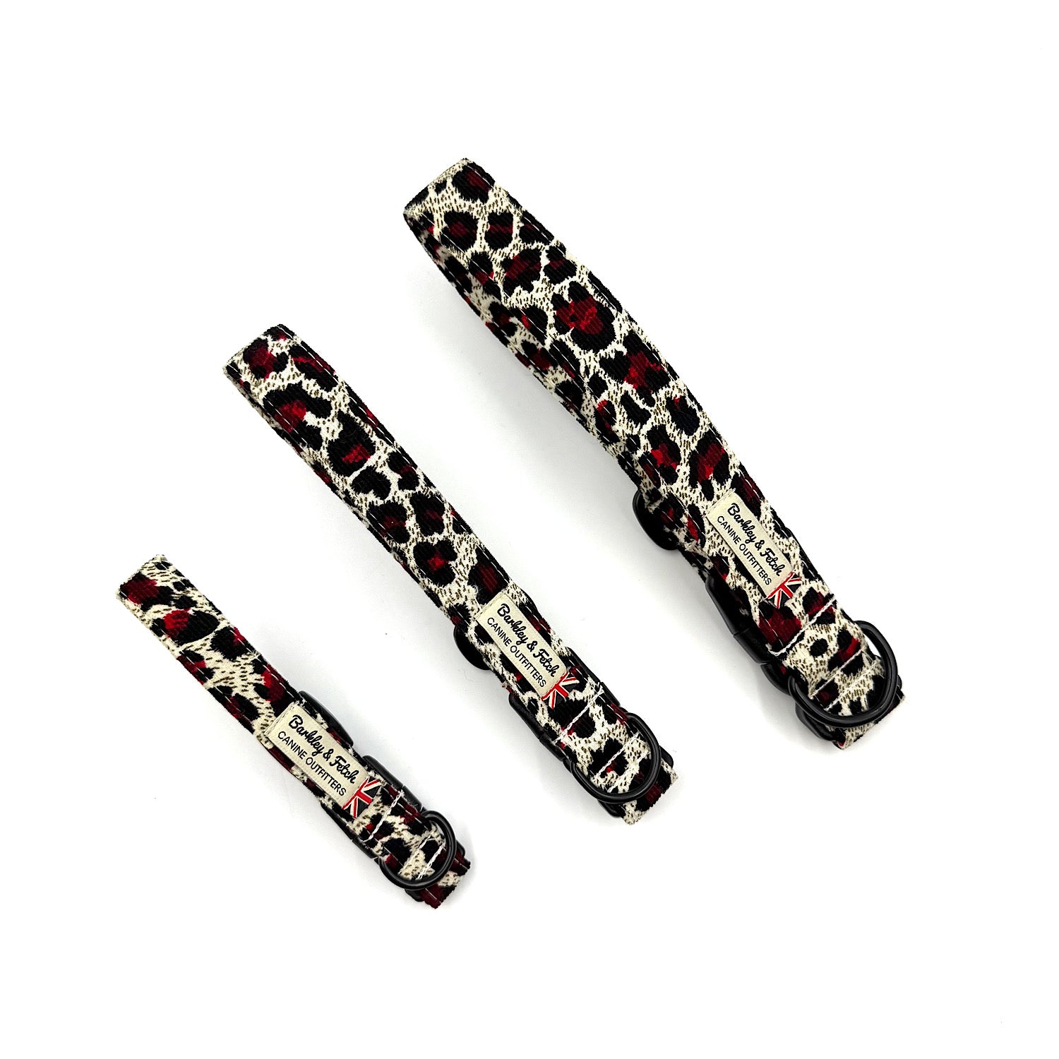 Three leopard print collars with red accents on a white background
