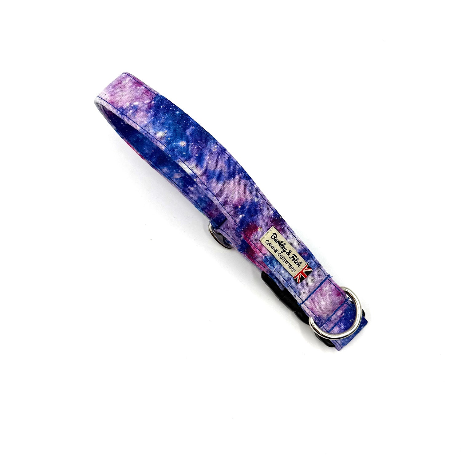 Galaxy patterned dog collar with brand label on a white background