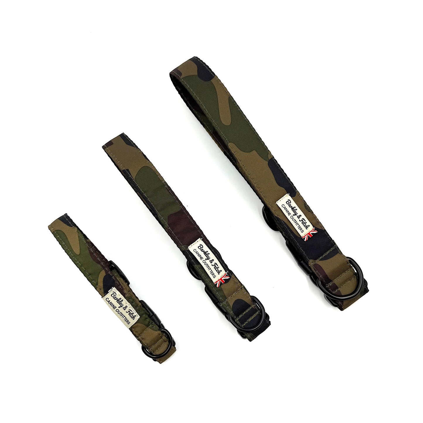 Three camouflage dog collars with visible brand labels on a white background