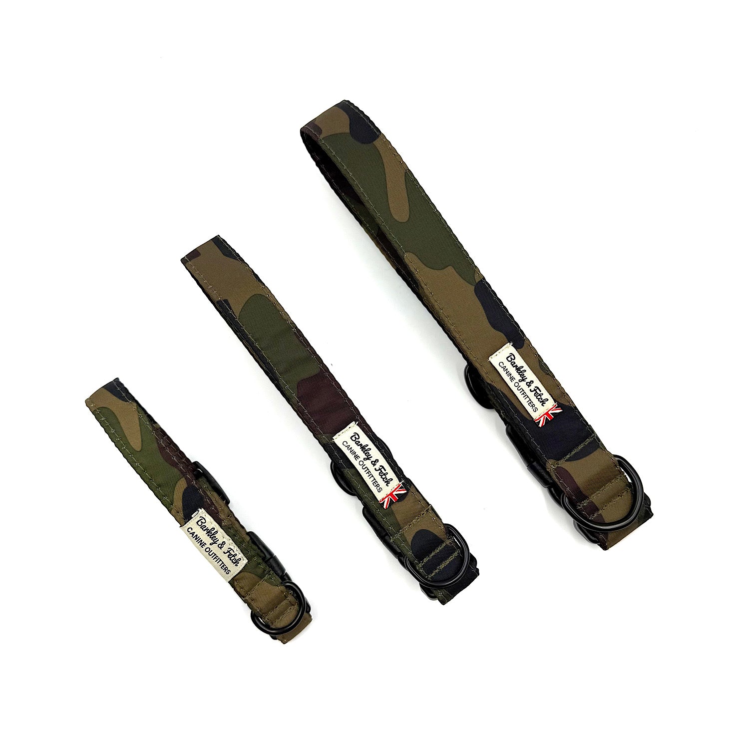 Three camouflage dog collars with visible brand labels on a white background