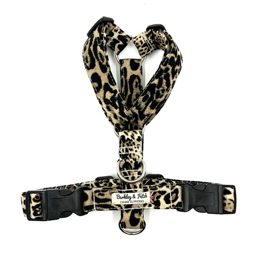 A leopard print strap harness for dogs with adjustable straps and two side release buckles at the back handmade in the UK by Barkley And Fetch