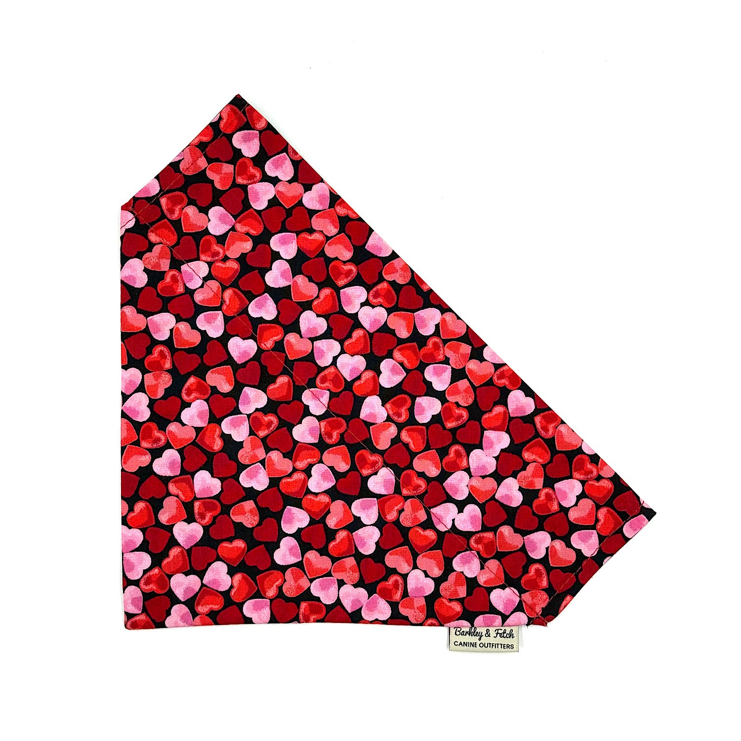 Heart-patterned dog bandana with red and pink hearts on a white background