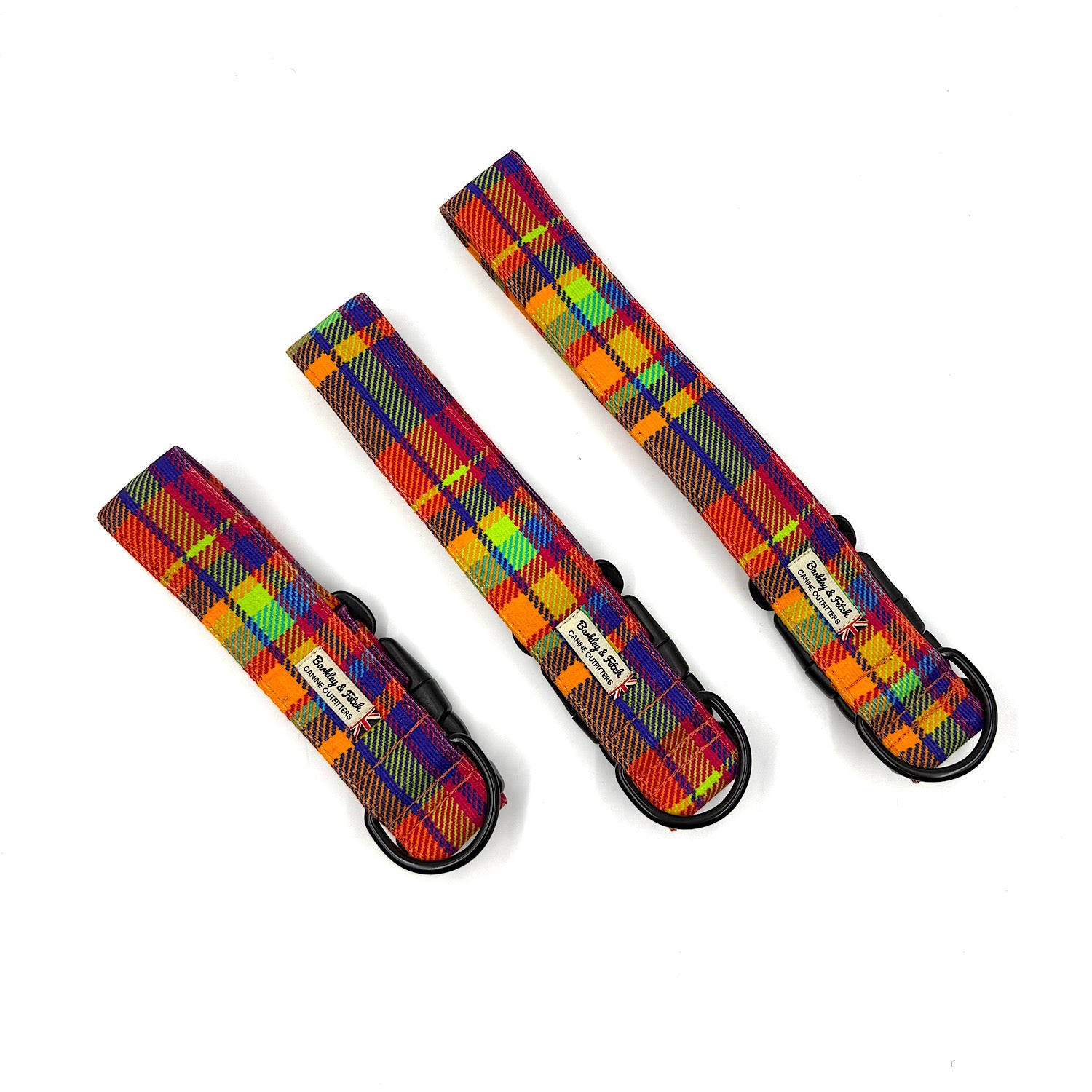 Three rainbow plaid dog collars on a white background handmade by Barkley and Fetch UK