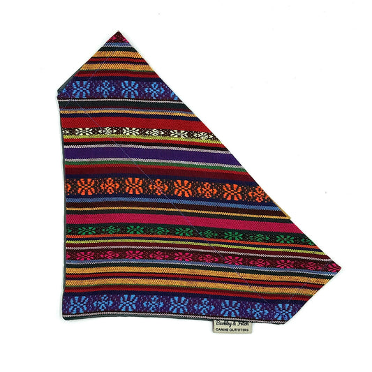 Colorful striped fabric with patterns on a white background