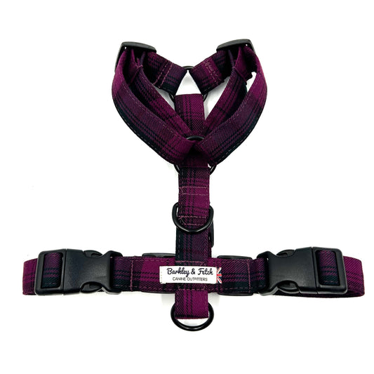 A purple and black tartan pattern dog harness with adjustable straps and side release buckles. handmade in the UK by Barkley and Fetch
