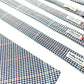 Set of patterned ties with a visible brand label on a white background