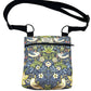 Floral and bird patterned bag with a strap on a white background handmade by barkley and fetch uk