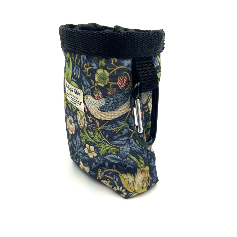 Floral-patterned pouch with a strap on a white background handmade by barkley and fetch uk