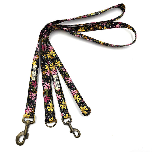 Floral patterned dog leash on a white background