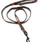 Dog leash with red and gray pattern on a white background