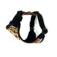 Floral-patterned dog harness on a white background