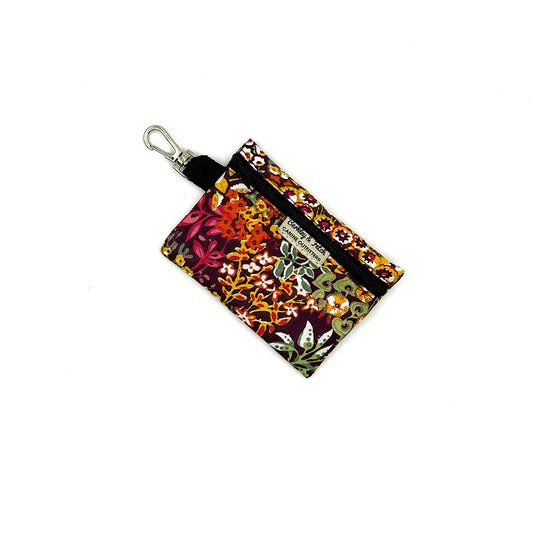 Floral patterned keychain pouch on a white background