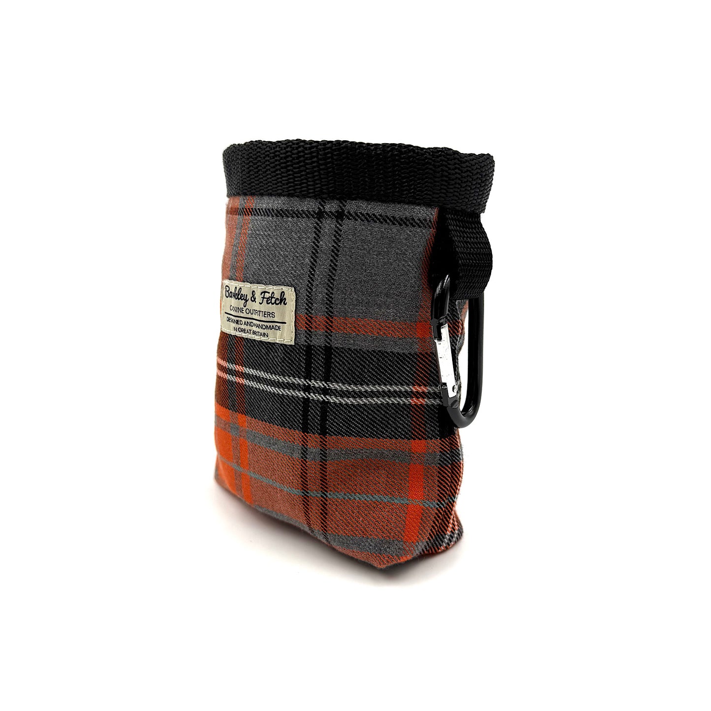 Plaid dog treat pouch with a carabiner on a white background
