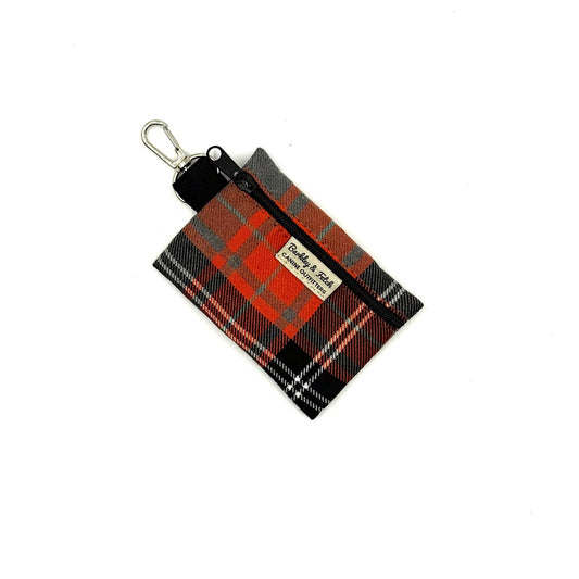 Plaid pouch with keychain attachment on a white background