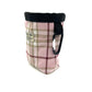 Pink plaid dog treat bag with black strap on a white background