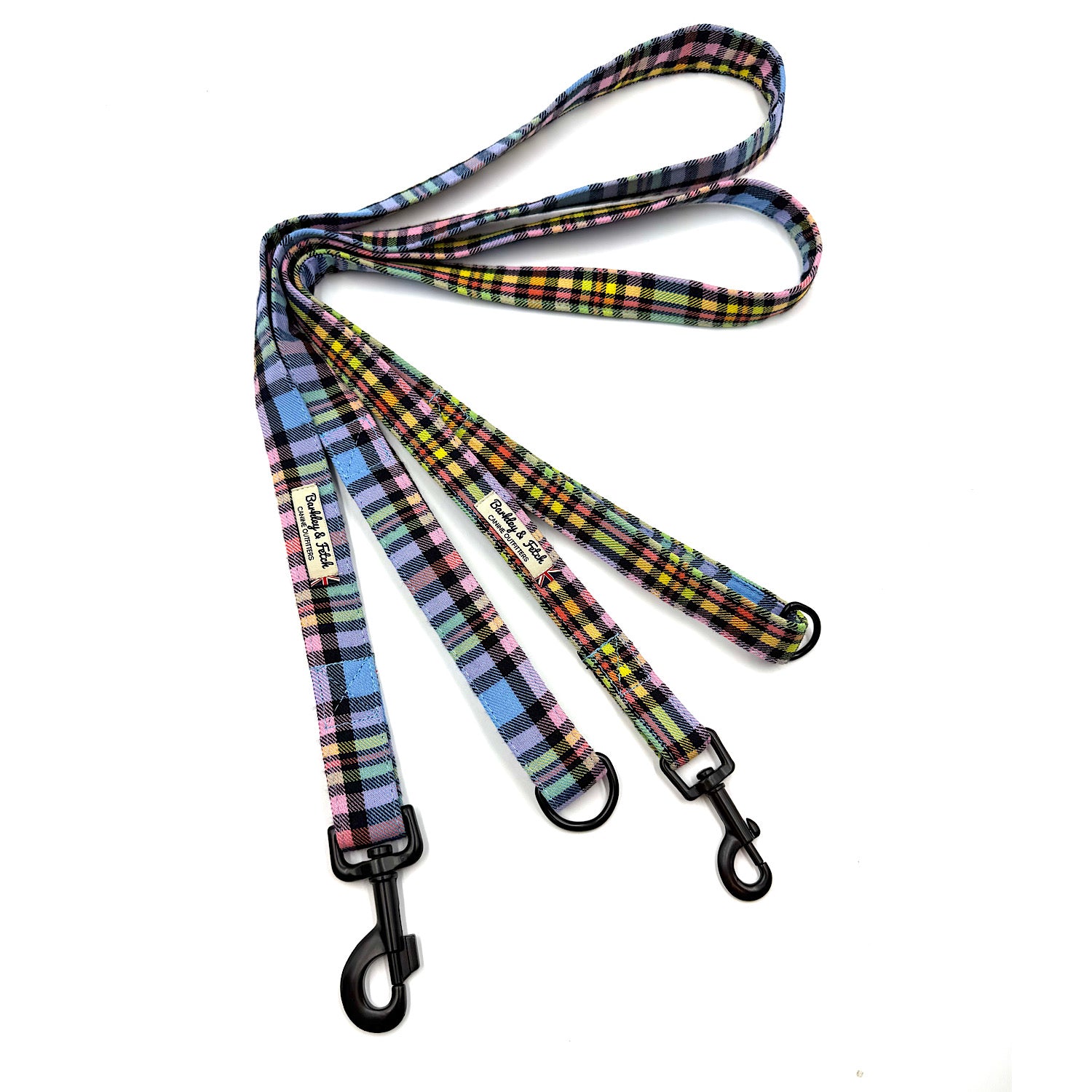Plaid patterned dog leash on a white background