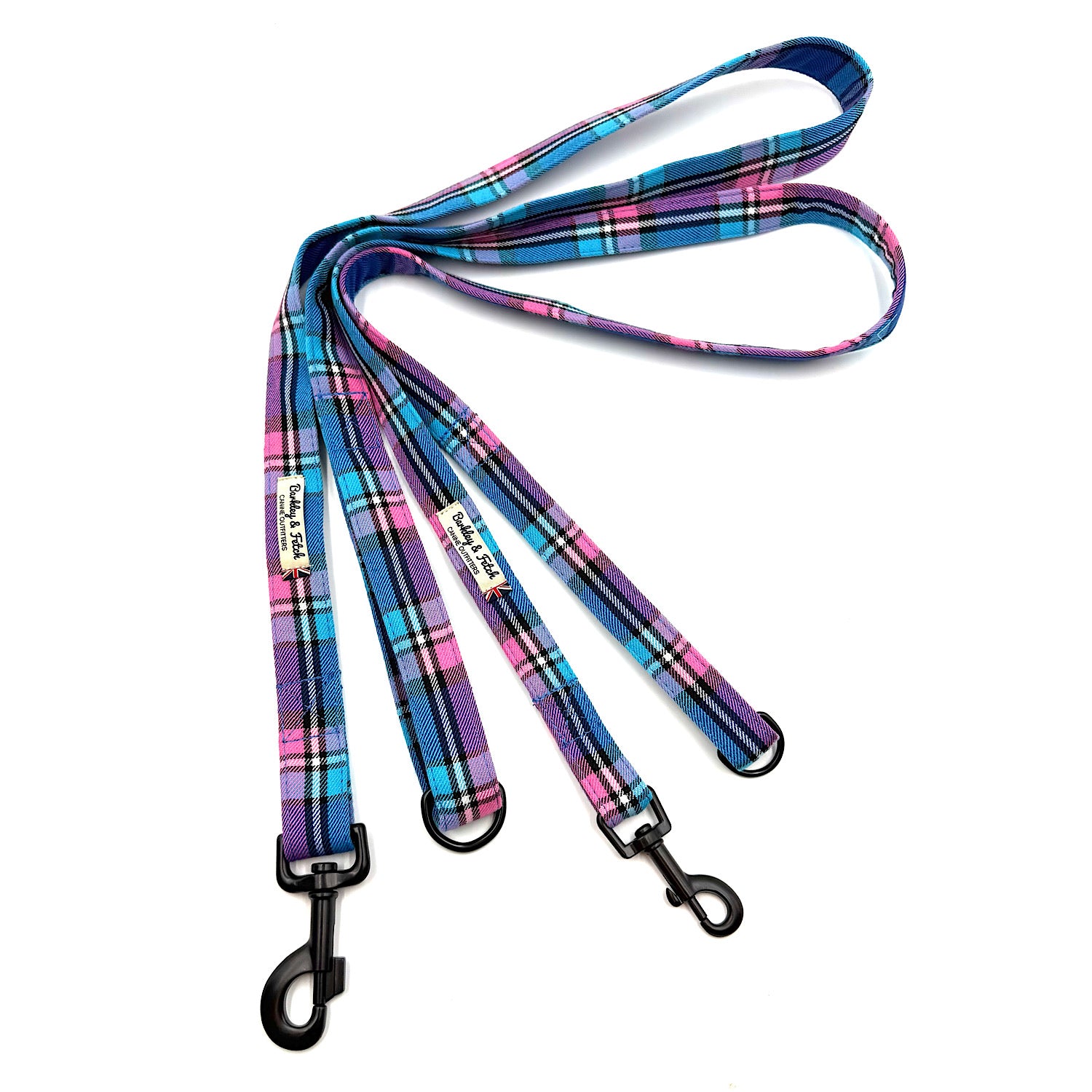Plaid dog leash with black clip on a white background