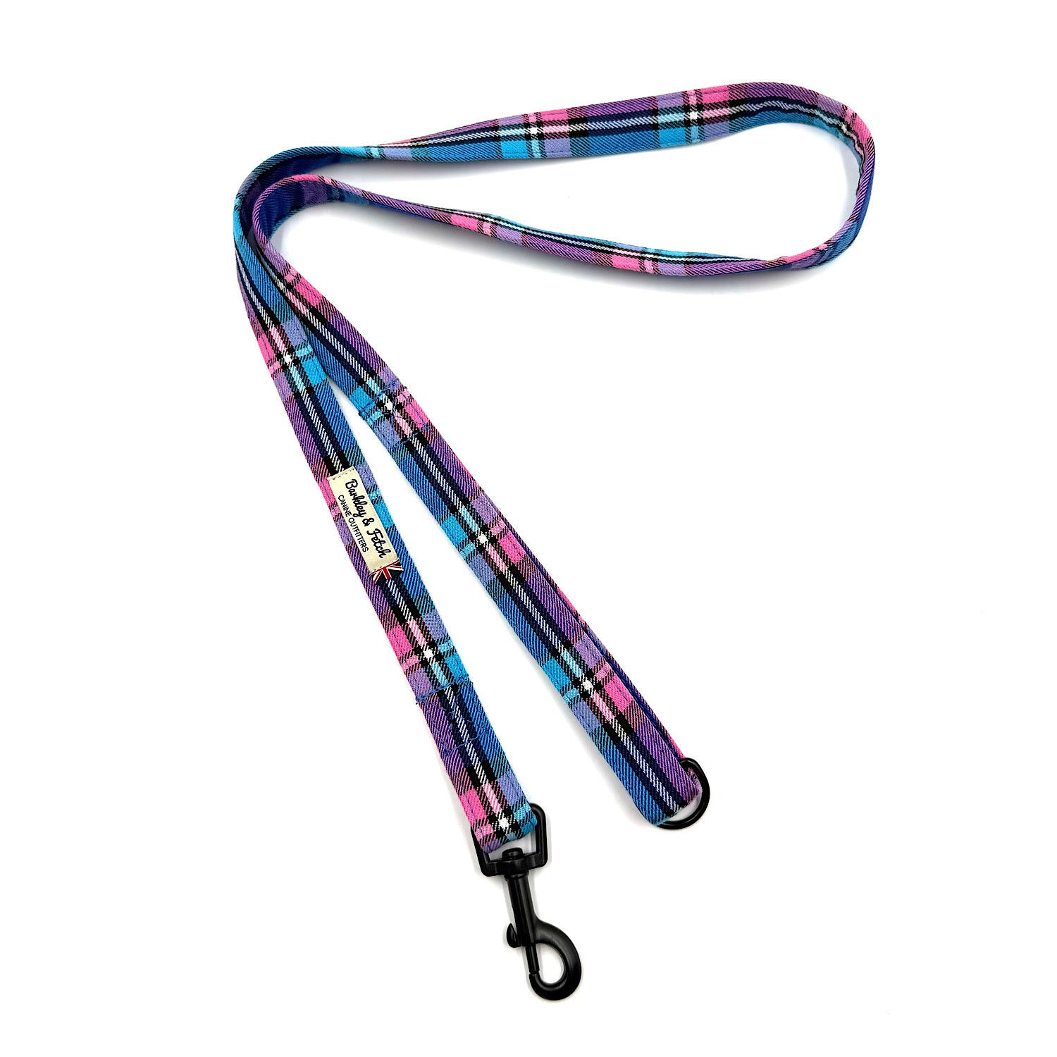 Colorful plaid dog leash with a black clip on a white background