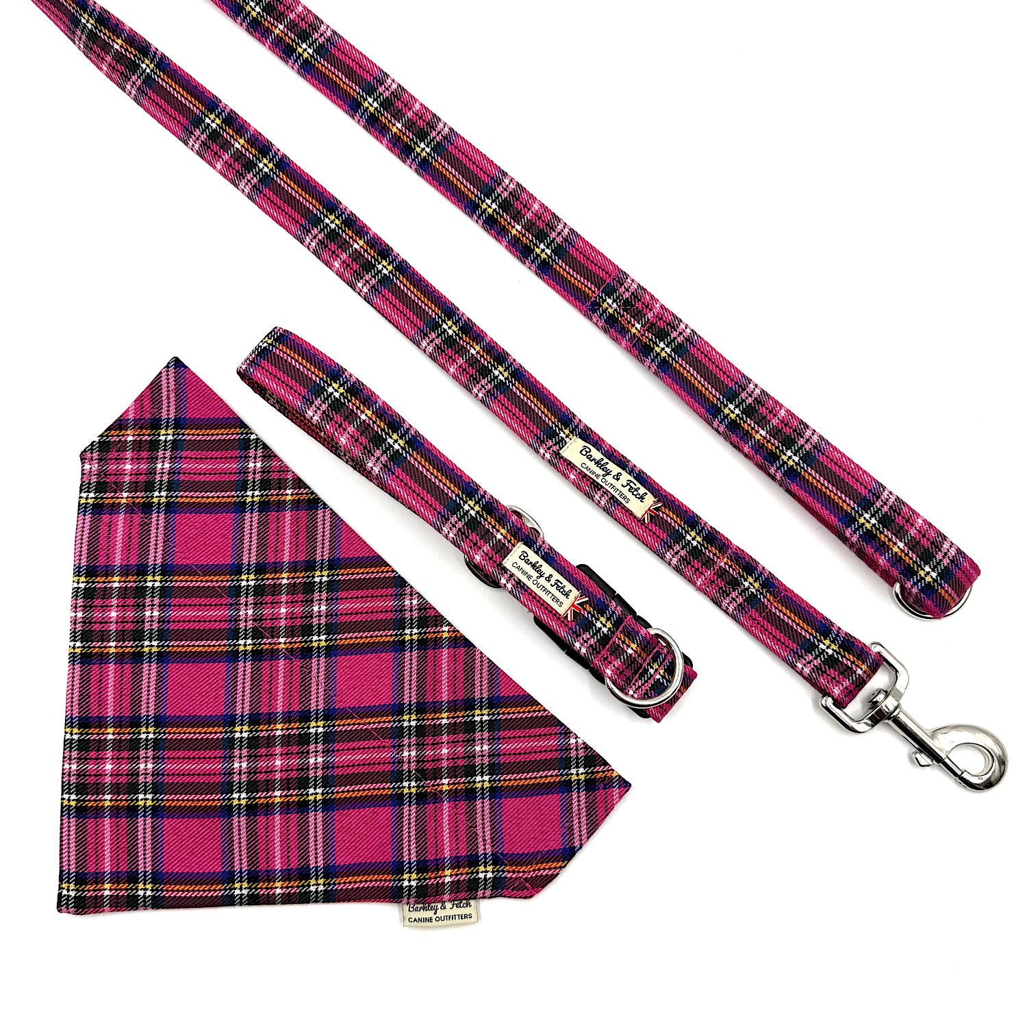 Pink plaid dog leash and bandana set on a white background