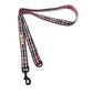 Pink and black plaid dog leash on a white background