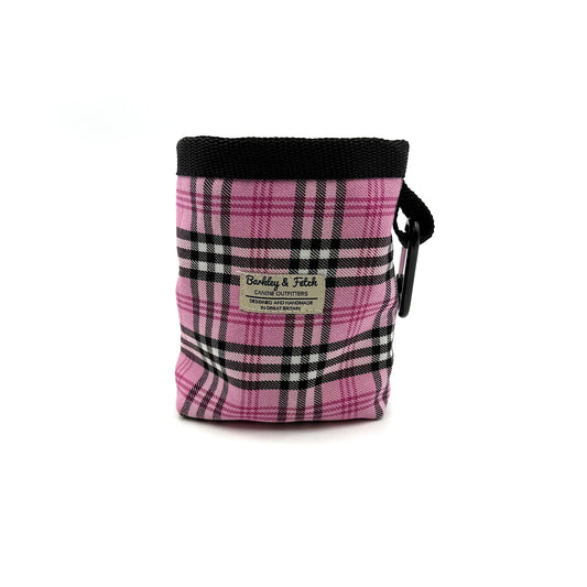 Pink plaid pouch with black accents on a white background