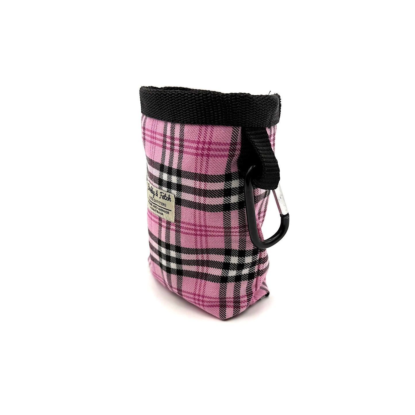 Pink plaid dog treat bag with black strap on a white background