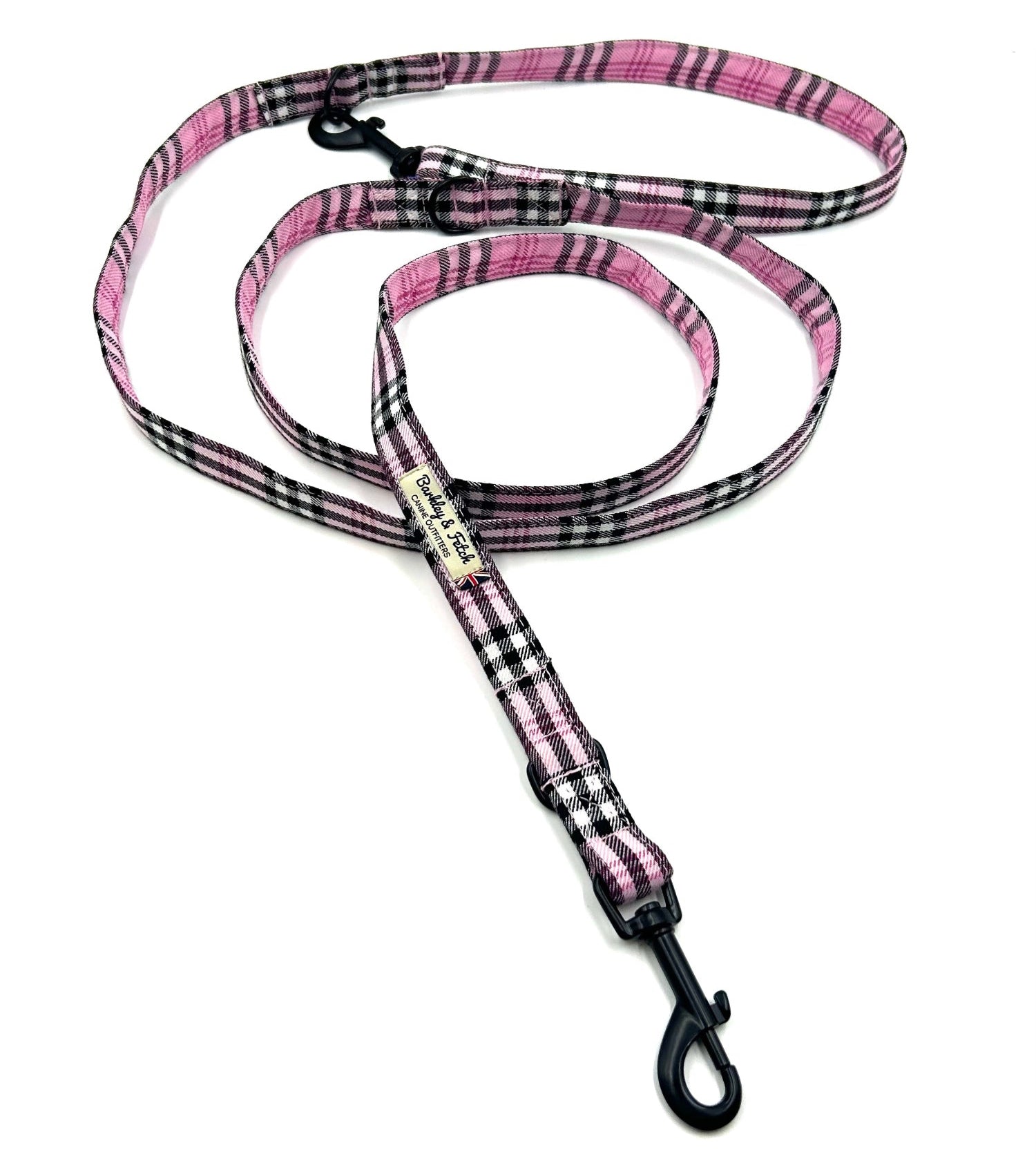 Pink and black checkered dog leash on a white background