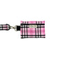 Pink plaid keychain with a black strap on a white background