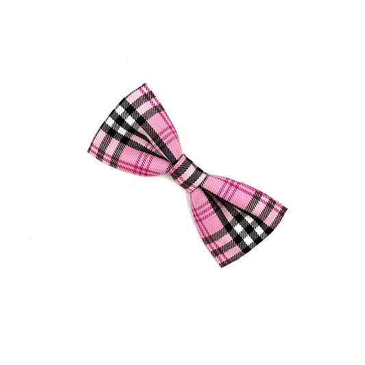 Pink and black checkered bow on a white background