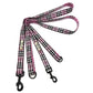 Pink and black checkered dog leash with metal clip on a white background