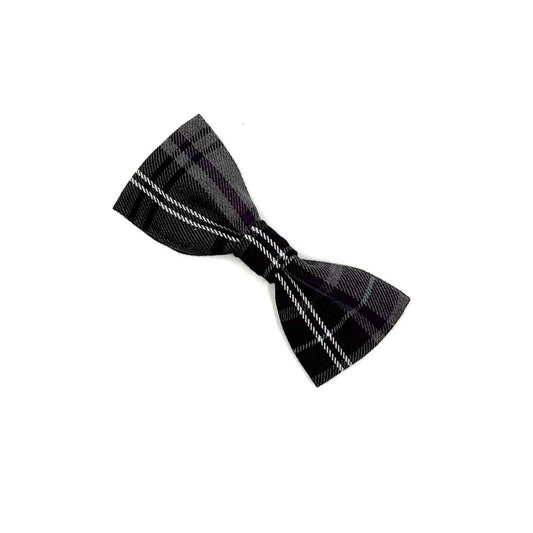 Black plaid bow tie on a white background