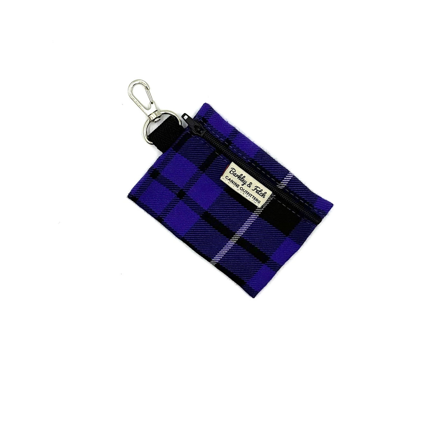 Blue plaid fabric keychain pouch with a visible brand label on a white background
