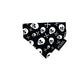 cat bandana with white skulls on black displayed on a white background handmade in the UK by Barkley And Fetch