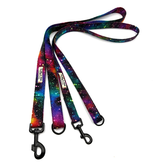 Colorful galaxy-patterned dog leash on a white background