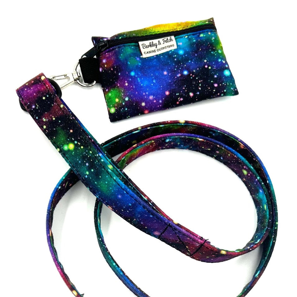 Colorful galaxy-patterned lanyard with attached cardholder on a white background