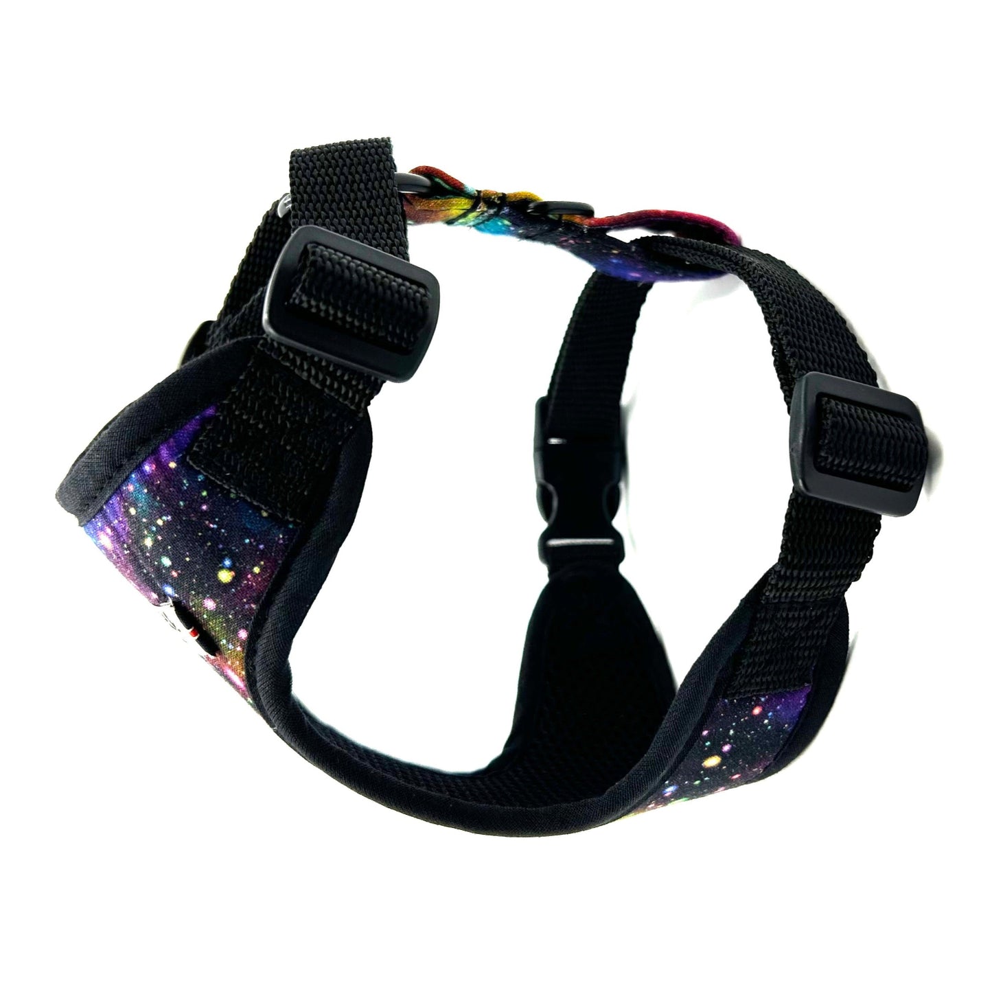 Black dog harness with galaxy pattern on a white background