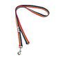 Rainbow dog leash with metal clip on a white background