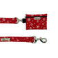 Red snowflake-patterned dog leash and pouch on a white background handmade by barkley and fetch uk
