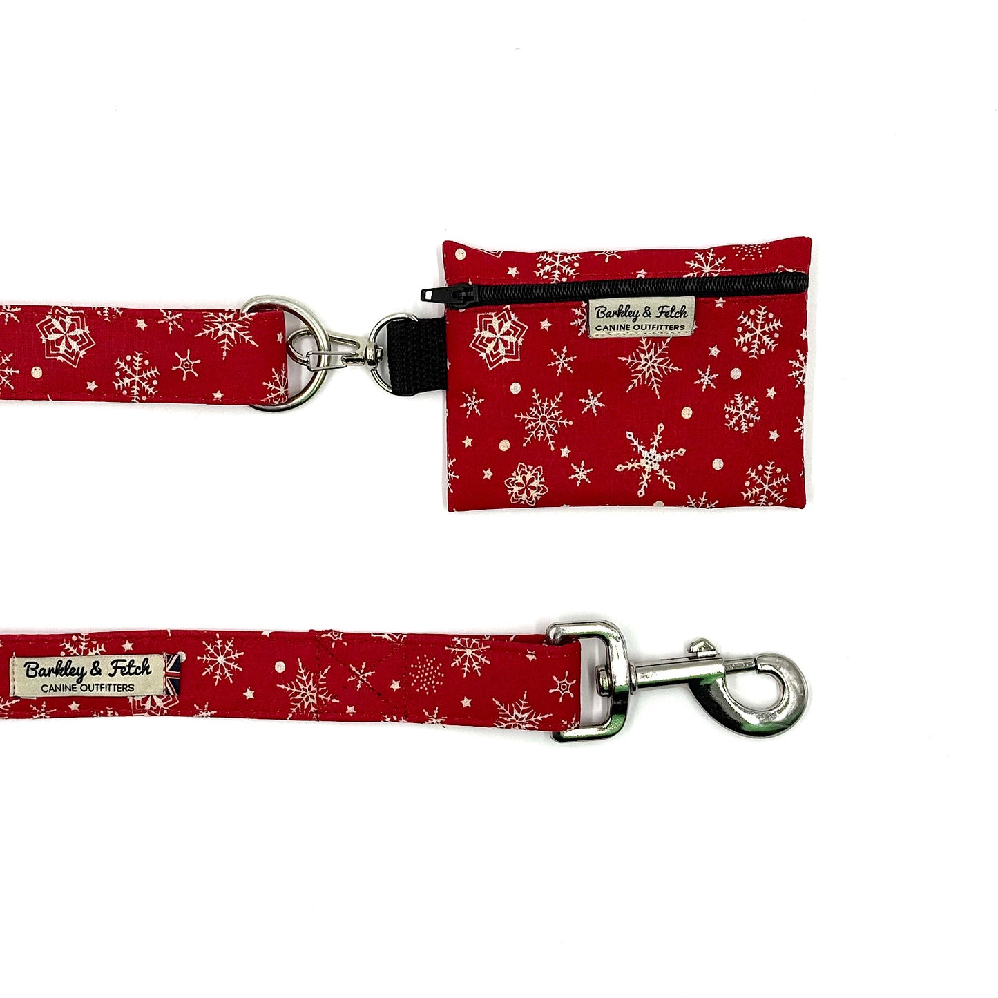 Red snowflake-patterned dog leash and pouch on a white background handmade by barkley and fetch uk