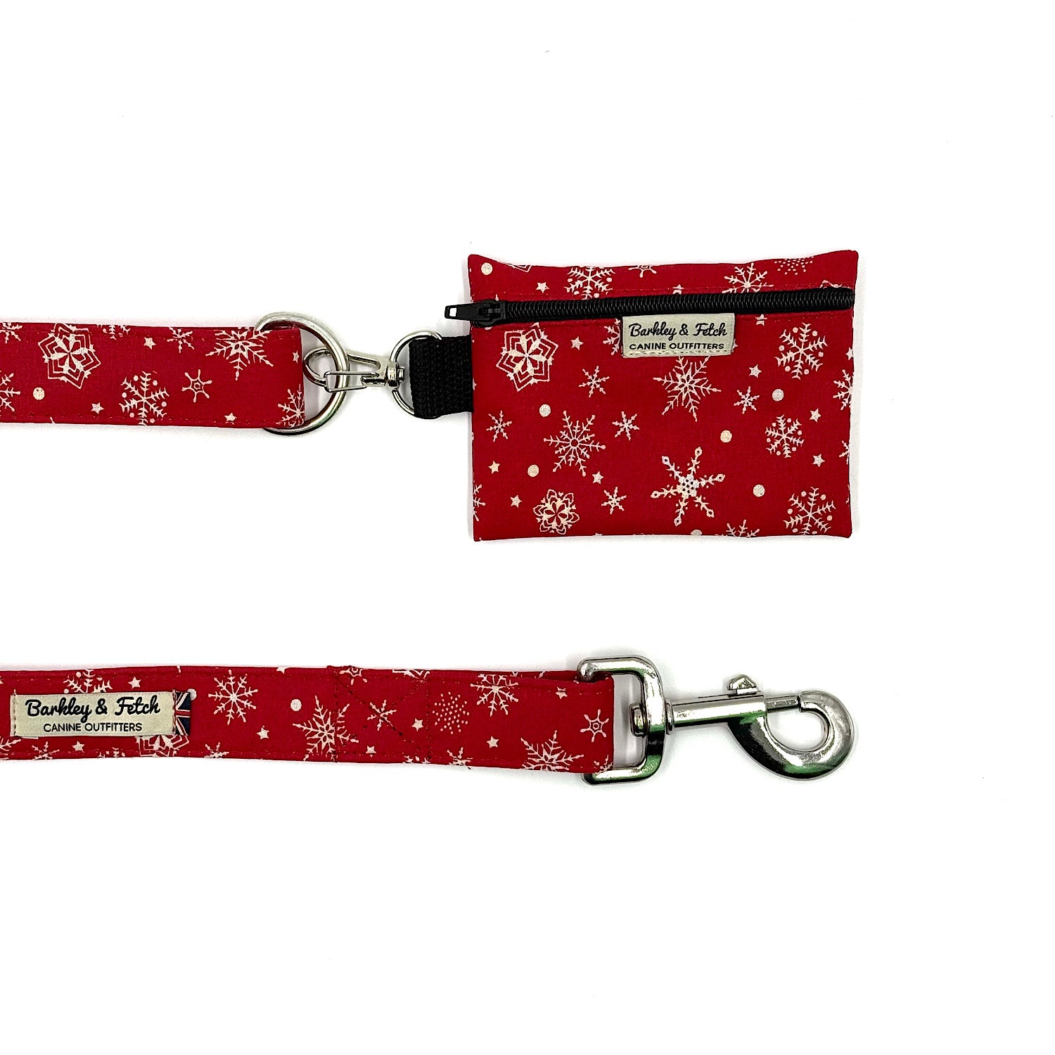 Red snowflake-patterned dog leash and pouch on a white background handmade by barkley and fetch uk