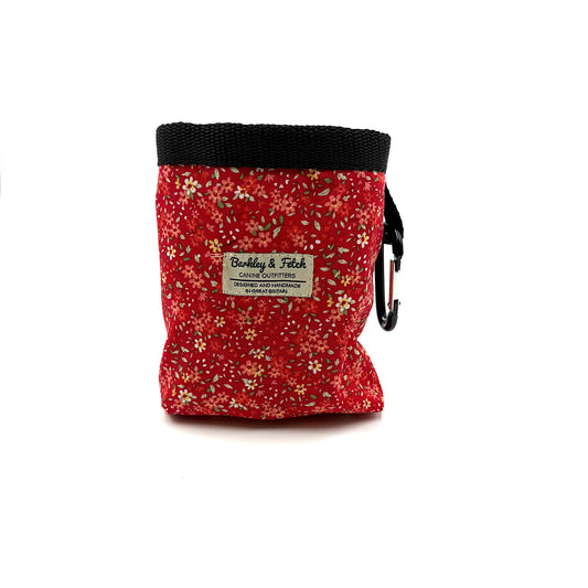 Red floral-patterned pouch with a black zipper on a white background handmade by Barkley and Fetch UK
