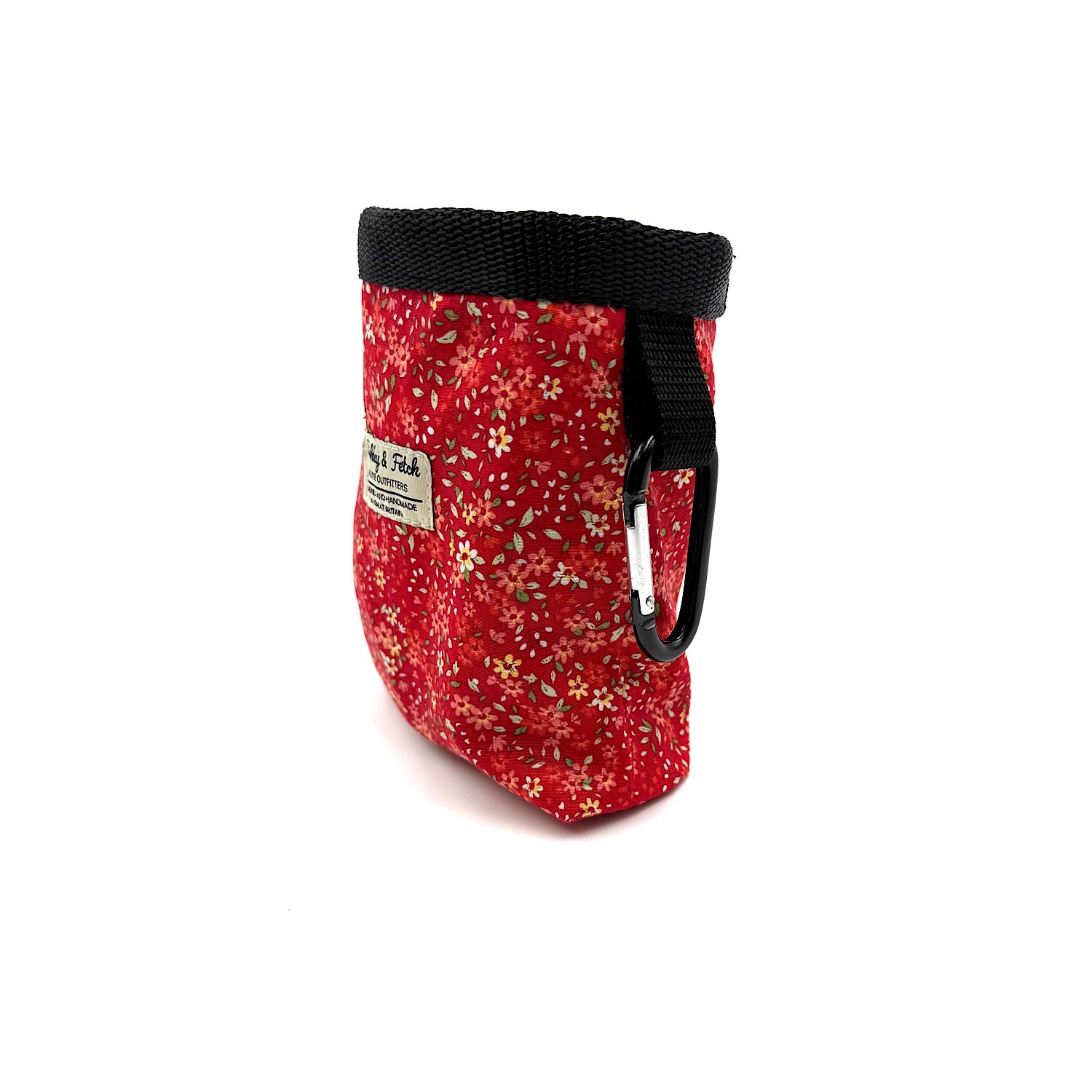 Red floral-patterned dog treat pouch with black strap and carabiner on a white background handmade by Barkley and Fetch UK
