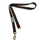 Plaid dog leash with brass clip on a white background