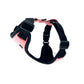 Black dog harness with pink geometric pattern on a white background