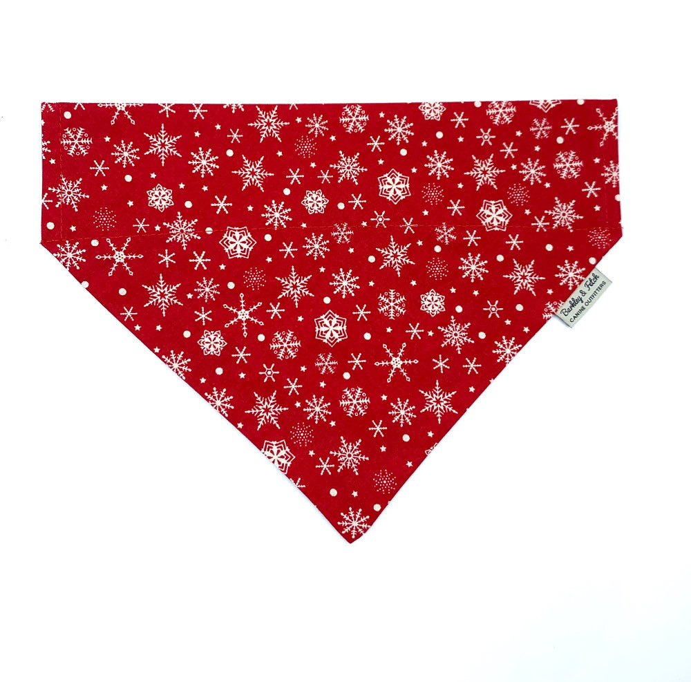 Red bandana with white snowflake pattern on a white background handmade in uk by Barkley and Fetch