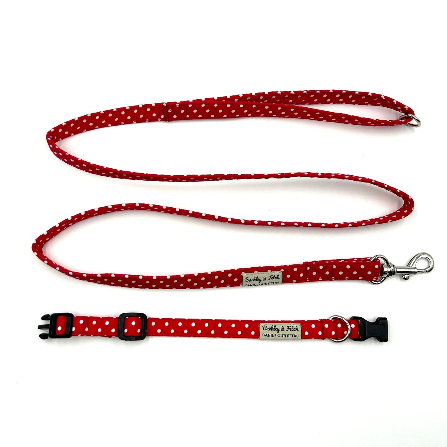 Red polka dot dog collar and leash set on a white background