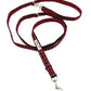 Red and black plaid dog leash on a white background