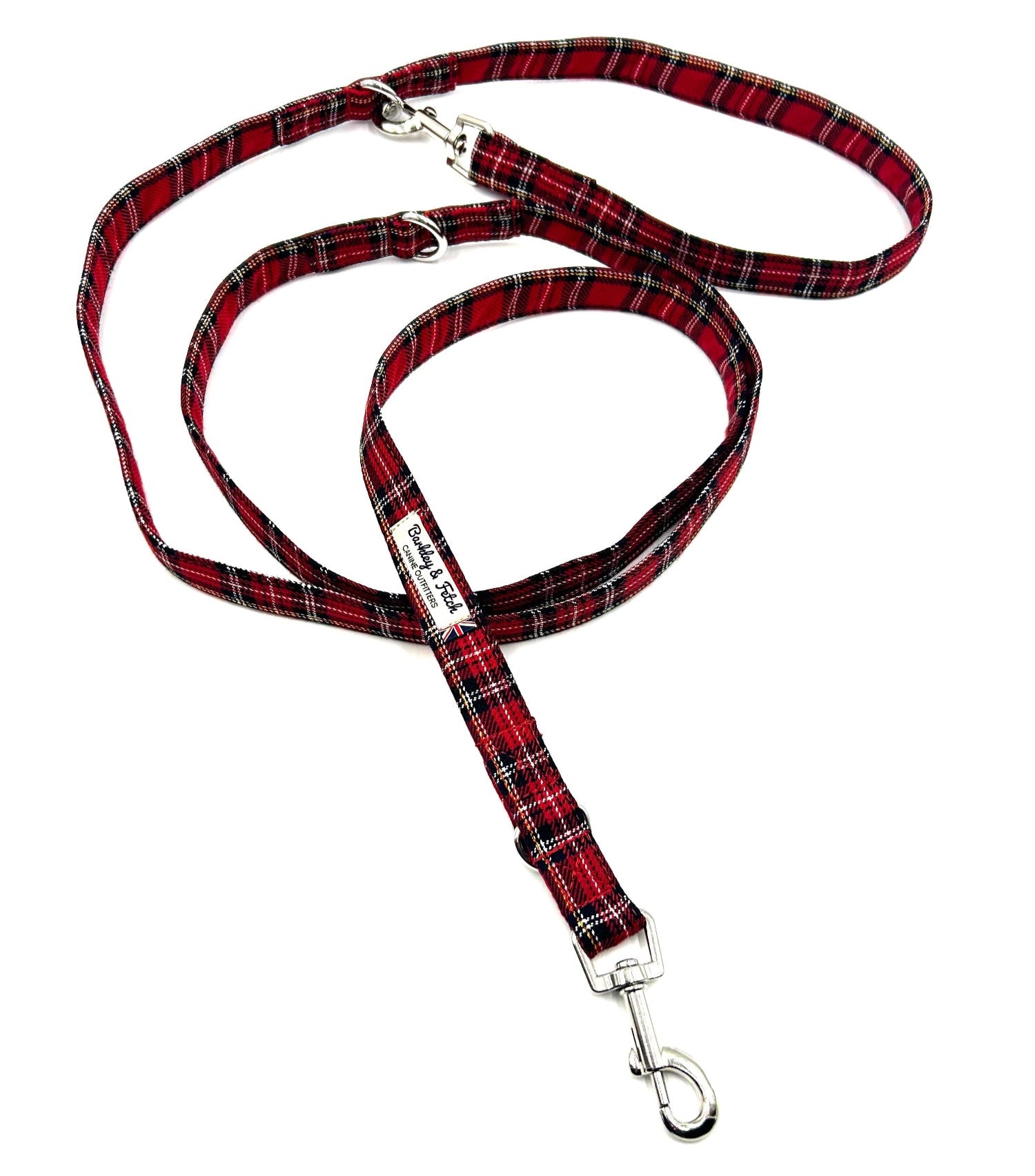 Red and black plaid dog leash on a white background